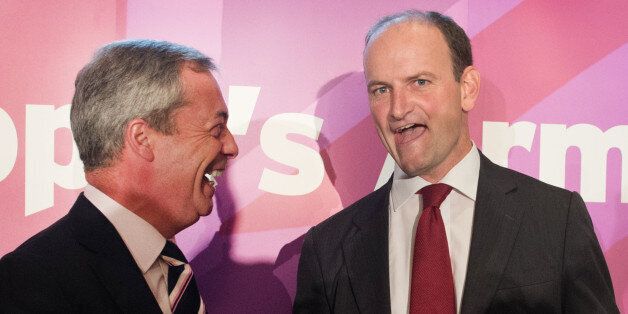 UKIP leader Nigel Farage (left) with Douglas Carswell during a press conference in central London where the Conservative MP defected to his party today.