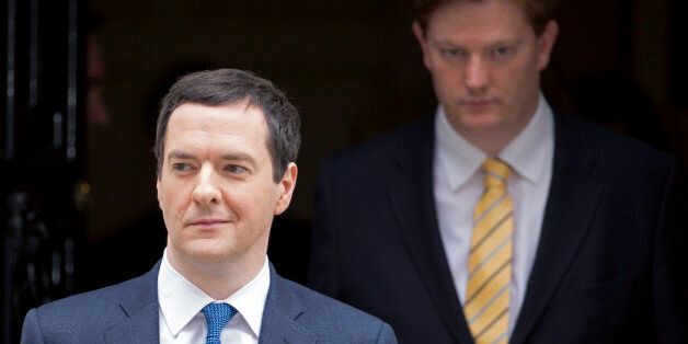 George Osborne, U.K. chancellor of the exchequer, left, and Danny Alexander, U.K. chief secretary to the treasury, leave 11 Downing Street in London, U.K., on Wednesday, March 19, 2014. Osborne will lay out a budget today focused on securing Britain's economic recovery and rebutting opposition Labour Party claims that he's ignoring the rising cost of living. Photographer: Jason Alden/Bloomberg via Getty Images