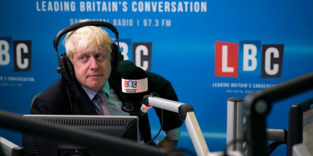 The Mayor of London Boris Johnson takes part in his monthly live phone-in on the radio station LBC, hosted by breakfast presenter Nick Ferrari at the LBC studio in London
