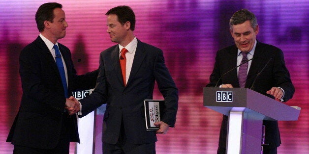 British opposition Conservative party leader, David Cameron (L), shakes hands with opposition Liberal Democrat leader, Nick Clegg (C), and Prime Minister, and leader of the ruling Labour Party, Gordon Brown (R), at the end of the live televised debate, at the University of Birmingham, in Birmingham, central England on April 29, 2010. Britain's main party leaders squared up for the final pre-election TV debate Thursday. AFP PHOTO/Gareth Fuller/Pool (Photo credit should read GARETH FULLER/AFP/G