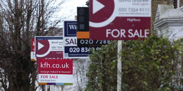 File photo dated 27/01/14 of for sale signs displayed outside houses in Finsbury Park, North London. House prices surged by 8.8\% year-on-year in January as they continued to increase at their fastest pace since 2010, Nationwide has reported.