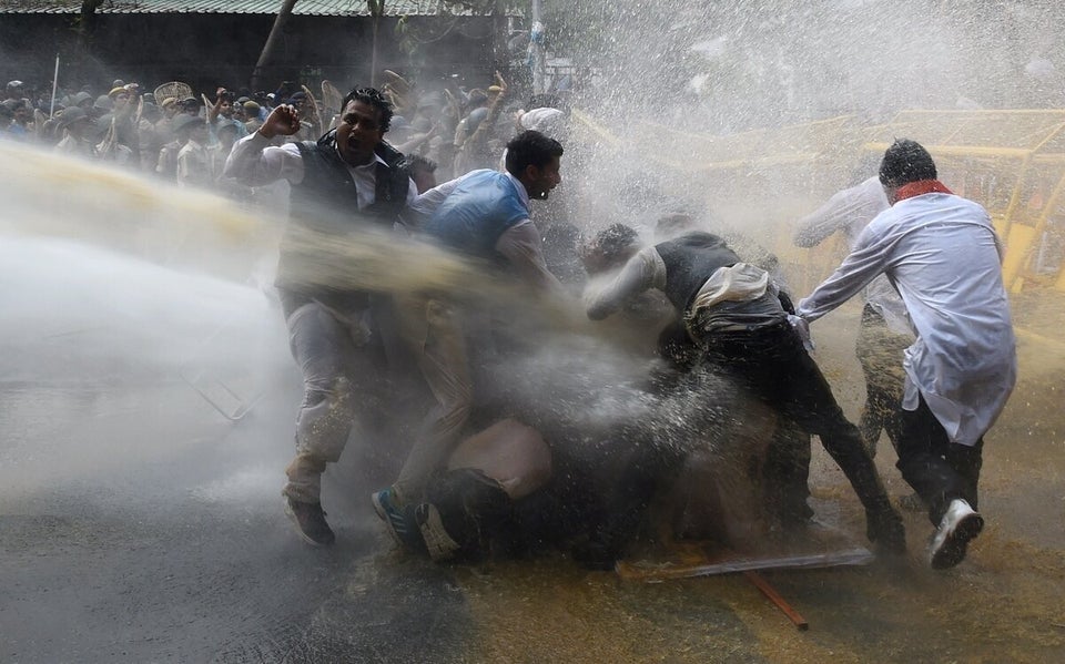 INDIA-POLITICS-ECONOMY-LAND-FARMING-PROTEST