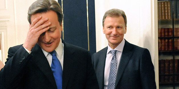 David Cameron and meets Cabinet Secretary Gus O'Donnell in the Cabinet Room of 10 Downing Street, London, after an audience with The Queen at which she invited him to form a new government.