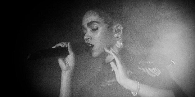 BERLIN, GERMANY - MARCH 06: (EDITORS NOTE: Image converted to Black and White) FKA Twigs performs live on stage during a concert at Astra on March 6, 2015 in Berlin, Germany. (Photo by Stefan Hoederath/Redferns via Getty Images)