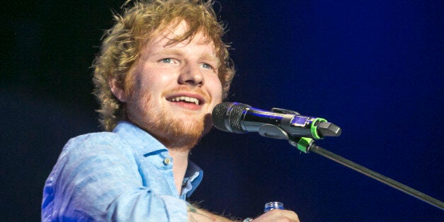 DUBAI, UNITED ARAB EMIRATES - MARCH 05: Ed Sheeran performs on stage at Media City Amphitheatre on March 5, 2015 in Dubai, United Arab Emirates. (Photo by Helen Boast/Redferns via Getty Images)