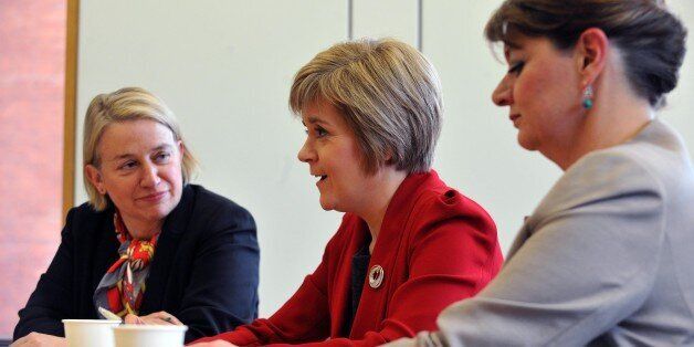 First Minister of Scotland Nicola Sturgeon (centre) during a meeting at Portculis House, central London, with the leader of the Green Party of England and Wales, Natalie Bennett (left) and the leader of Plaid Cymru Leanne Woodand, as they call for the three parties to be heard in general election debates.