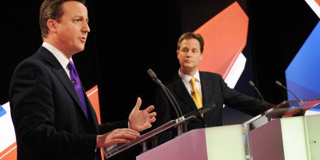File photo dated 22/04/10 of Conservative leader David Cameron (left) speaking as Lib Dem leader Nick Clegg (centre) and Labour leader Gordon Brown look on during a live leaders' election debate, as the chances of televised political debates taking place during the general election campaign appear no more certain after proposals for a revised format sparked fresh complaints from excluded parties.