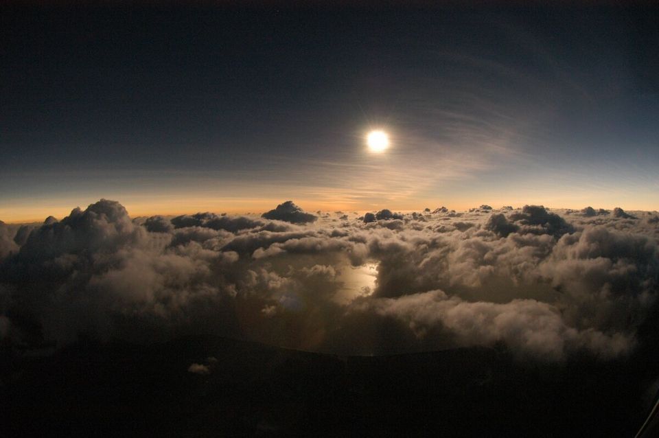 Solar Eclipse Above Clouds