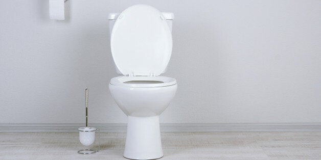 White toilet bowl in a bathroom