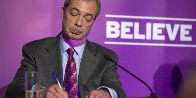 Britain's UKIP party leader Nigel Farage answers questions from the media at the Movie Starr Cinema in Canvey Island, east of London, on February 12, 2015, as he makes his first major speech of the 2015 General Election. AFP PHOTO/JUSTIN TALLIS (Photo credit should read JUSTIN TALLIS/AFP/Getty Images)