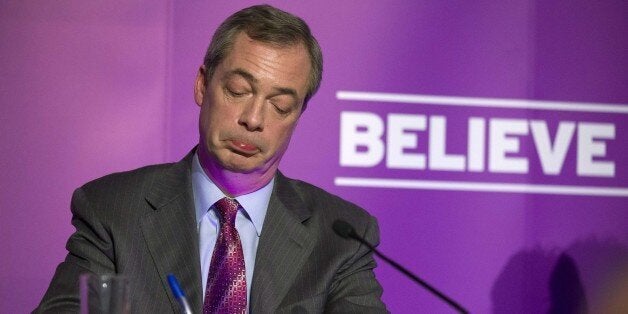 Britain's UKIP party leader Nigel Farage answers questions from the media at the Movie Starr Cinema in Canvey Island, east of London, on February 12, 2015, as he makes his first major speech of the 2015 General Election. AFP PHOTO/JUSTIN TALLIS (Photo credit should read JUSTIN TALLIS/AFP/Getty Images)