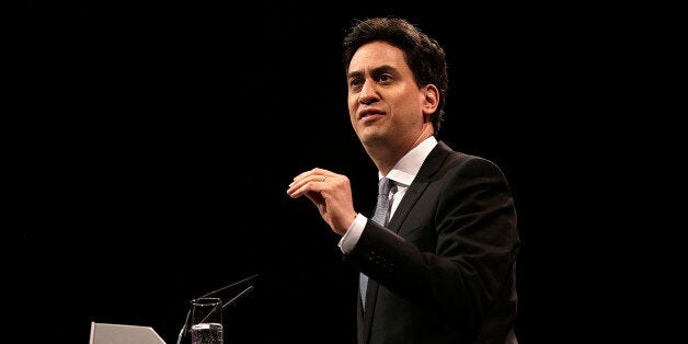 Ed Miliband, leader of the U.K. opposition Labour Party, gestures as he speaks during a one-day event in Birmingham, U.K., on Saturday, March 14, 2015. Miliband painted a stark picture of a future Conservative government, accusing the party of planning to roll back public spending to a time when there was no NHS and children left school at 14 years of age. Photographer: Matthew Lloyd/Bloomberg via Getty Images