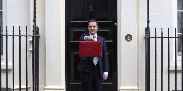 George Osborne, U.K. chancellor of the exchequer, holds the dispatch box containing the 2015 budget as he stands outside 11 Downing Street in London, U.K., on Wednesday, March 18, 2015. U.K. unemployment fell to its lowest level in more than six years and real pay growth accelerated in a boost for Osborne as he prepares to announce his final budget before the election. Photographer: Chris Ratcliffe/Bloomberg via Getty Images