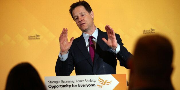 LONDON, ENGLAND - MARCH 31: Nick Clegg, the leader of the Liberal Democrat party, raises his hands while speaking as he launches his party's NHS manifesto at a press conference on March 31, 2015 in London, England. The leader launched the Liberal democrat party's NHS manifesto on the second day of campaigning in what is predicted to be Britain's closest national election in decades. (Photo by Carl Court/Getty Images)