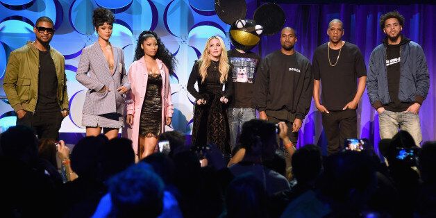 NEW YORK, NY - MARCH 30: (L-R) Usher, Rihanna, Nicki Minaj, Madonna, Deadmau5, Kanye West, JAY Z, and J. Cole onstage at the Tidal launch event #TIDALforALL at Skylight at Moynihan Station on March 30, 2015 in New York City. (Photo by Jamie McCarthy/Getty Images for Roc Nation)