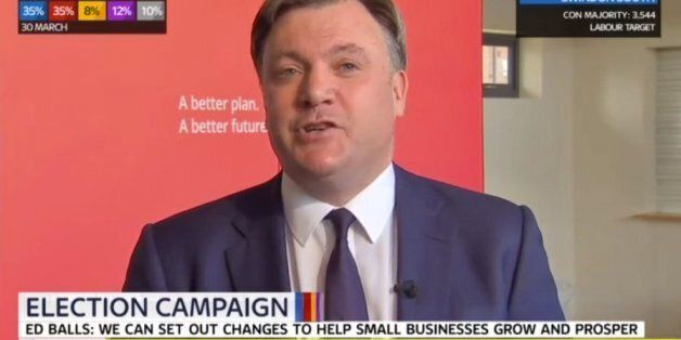 Shadow chancellor Ed Balls reacts as he listens to a guest speaker at the launch of their party's business
