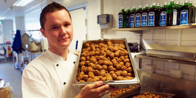 IKEA world famous meatballs served with boiled potatoes, a brown sauce and lingonberry jam at the local store, Sweden, Linkoping. (Photo by: MyLoupe/UIG via Getty Images)