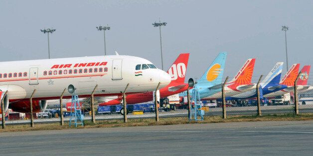 An Air India Airbus A320 aircraft is seen on the tarmac at the Indira Gandhi International Airport in New Delhi on June 24, 2010. AFP PHOTO/RAVEENDRAN (Photo credit should read RAVEENDRAN/AFP/Getty Images)