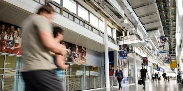 File photo dated 08/04/15 of people walking down the main concourse in the sports science building at the University of Bath, as a survey has found it offers the best student experience in the country.