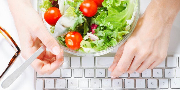 Young businesswoman typing on the laptop.