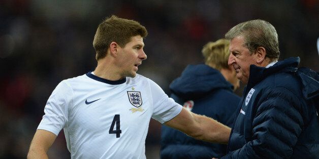 LONDON, ENGLAND - NOVEMBER 19: England manager Roy Hodgson speaks to Steven Gerrard of England during the International Friendly match between England and Germany at Wembley Stadium on November 19, 2013 in London, England. (Photo by Michael Regan - The FA/The FA via Getty Images)