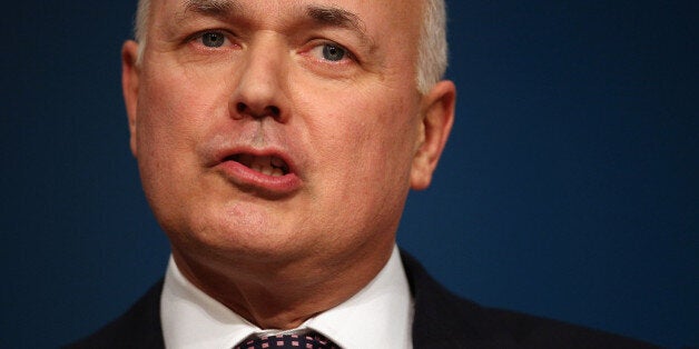 BIRMINGHAM, ENGLAND - OCTOBER 08: Secretary of State for Work and Pensions Iain Duncan Smith delivers his speech to the Conservative party conference in the International Convention Centre on October 8, 2012 in Birmingham, England. The annual, four-day Conservative party conference began yesterday and features speeches from Cabinet ministers and the Mayor of London. (Photo by Oli Scarff/Getty Images)