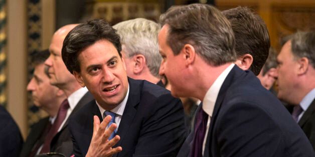 File photo dated 27/02/14 of Labour leader Ed Miliband (left) speaking with Prime Minister David Cameron. Ed Miliband has upped the pressure on David Cameron to agree to a new round of televised general election leadership debates as he signalled his willingness to see changes to the format.