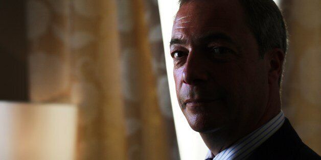 UK Independence Party (UKIP) leader Nigel Farage poses for a picture at the Portsmouth Guildhall on April 28, 2014. Farage visited Portsmouth on a campaign tour ahead of the European elections in May. AFP PHOTO / ADRIAN DENNIS (Photo credit should read ADRIAN DENNIS/AFP/Getty Images)