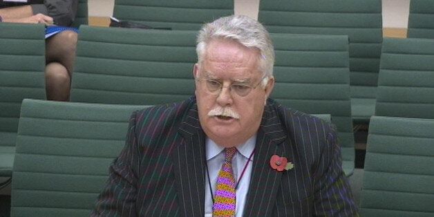 Co-operative Bank chairman Reverend Paul Flowers in front of the Treasury Select Committee on November 6 to answer questions on the Project Verde inquiry.