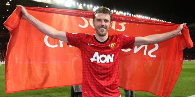 MANCHESTER, ENGLAND - APRIL 22: Michael Carrick of Manchester United celebrates at final whistle of the Barclays Premier League match between Manchester United and Aston Villa at Old Trafford on April 22, 2013 in Manchester, England. (Photo by Matthew Peters/Man Utd via Getty Images)