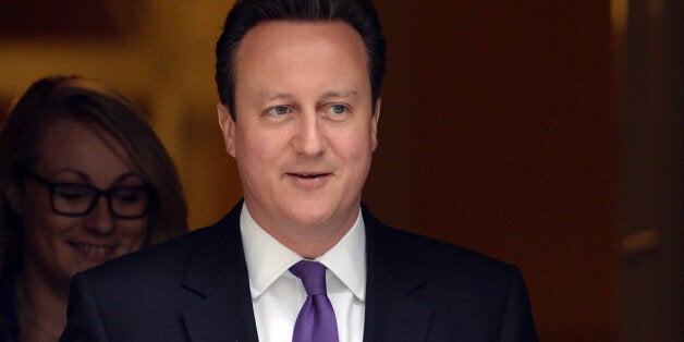 Prime Minister David Cameron leaves Downing Street for the House of Commons ion London for Prime Minister's Questions and the Budget speech.