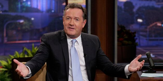 THE TONIGHT SHOW WITH JAY LENO -- Episode 4551 -- Pictured: (l-r) Piers Morgan during an interview with host Jay Leno on October 23, 2013 -- (Photo by: Paul Drinkwater/NBC/NBCU Photo Bank via Getty Images)