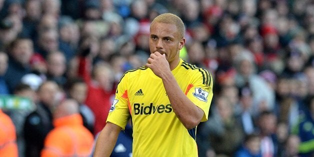 Sunderland's Wes Brown leaves the pitch after being shown a red card for a challenge on Stoke City's Charlie Adam