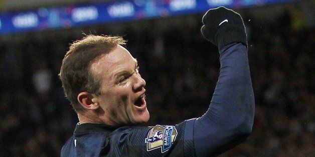 Wayne Rooney celebrating Manchester United's first goal