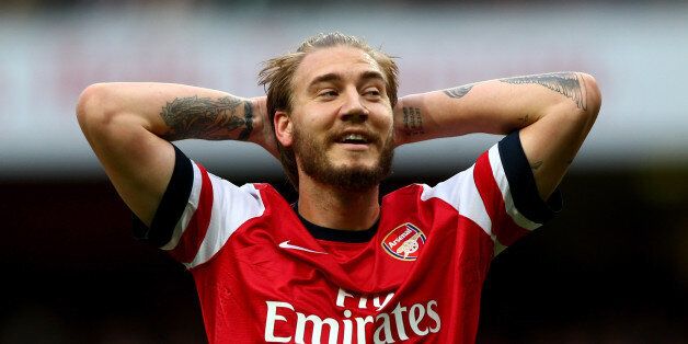 LONDON, ENGLAND - OCTOBER 19: Nicklas Bendtner of Arsenal reacts during the Barclays Premier League match between Arsenal and Norwich City at Emirates Stadium on October 19, 2013 in London, England. (Photo by Paul Gilham/Getty Images)