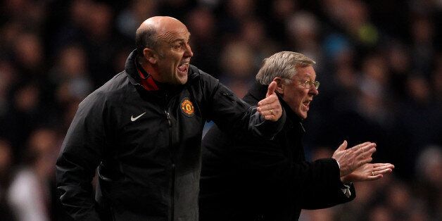 MANCHESTER, ENGLAND - NOVEMBER 10: Manchester United Manager Sir Alex Ferguson (R) and Assistant Mike Phelan encourage their players during the Barclays Premier League match between Manchester City and Manchester United at the City of Manchester Stadium on November 10, 2010 in Manchester, England. (Photo by Alex Livesey/Getty Images)