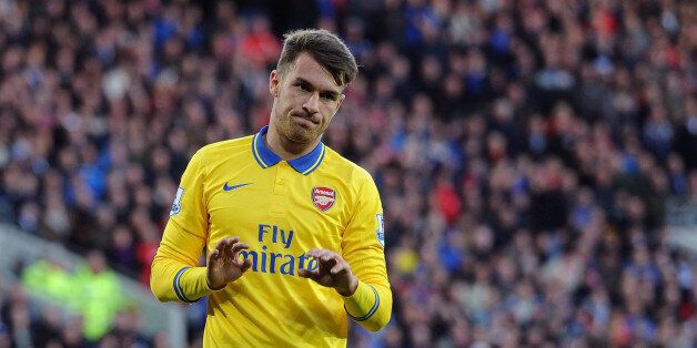CARDIFF, WALES - NOVEMBER 30: Aaron Ramsey doesn't celebrate scoring Arsenal's goal during the match Cardiff City against Arsenal at Cardiff City Stadium on November 30, 2013 in Cardiff, Wales. (Photo by David Price/Arsenal FC via Getty Images)