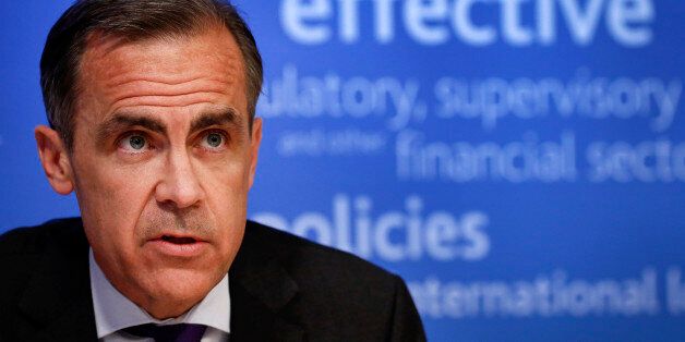 Mark Carney, governor of the Bank of England and chairman of the Financial Stability Board (FSB), speaks during a news conference following the board's plenary meeting at the Bank of England in London, U.K., on Monday, March 31, 2014. Carney said the FSB wants lenders and the International Swaps and Derivatives Association Inc., an industry group, to come up with proposals to write temporary pauses into derivatives contracts struck with banks that hit financial trouble. Photographer: Simon Dawso