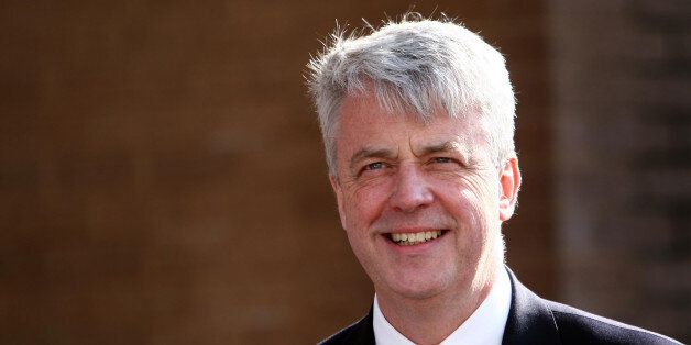Health Secretary Andrew Lansley, during a visit to Birmingham Queen Elizabeth Hospital where he was given a tour of an NHS research facility today as the Government announced a £100 million fund to develop new treatments for patients.
