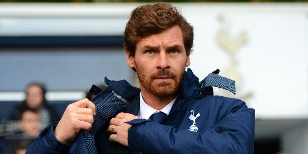 LONDON, ENGLAND - DECEMBER 01: Andre Villas-Boas manager of Tottenham Hotspur adjusts his coat during the Barclays Premier League Match between Tottenham Hotspur and Manchester United at White Hart Lane on December 1, 2013 in London, England. (Photo by Michael Regan/Getty Images)