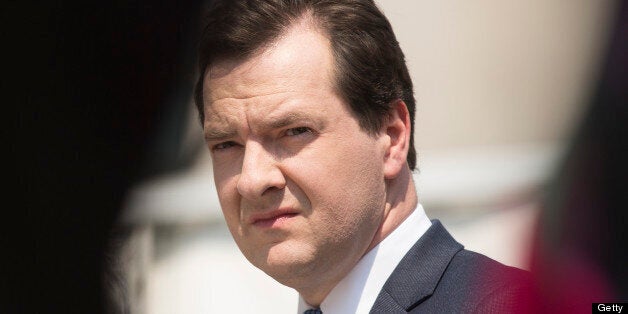 George Osborne, U.K. chancellor of the exchequer, pauses as he tours the construction site of the Francis Crick Institute's new building in London, U.K., on Thursday, June 6, 2013. At 1 million square feet and with as many as 1,500 employees, including 1,250 scientists, the Crick Institute is set to become Europe's largest science research center in one building. Photographer: Simon Dawson/Bloomberg via Getty Images