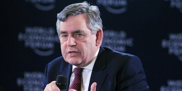 Former British Prime Minister Gordon Brown speaks about 'Safe Schools Initiative' at the World Economic Forum in Abuja on May 7, 2014. The World Economic Forum on Africa kicked off in Abuja today in the shadow of security fears and mounting global concern about the plight of more than 200 schoolgirls abducted by Islamist militants. The showcase regional conference, dubbed 'Africa's Davos', had been meant to turn the spotlight on the host nation, which recently became the continent's largest economy, promote it as a place to do business and reflect its growing global clout. Instead, the build-up has been dominated by the 223 girls still missing after being abducted in the remote northeastern town of Chibok three weeks ago by Boko Haram fighters, who have since threatened to sell them as slave brides.AFP PHOTO/PIUS UTOMI EKPEI (Photo credit should read PIUS UTOMI EKPEI/AFP/Getty Images)