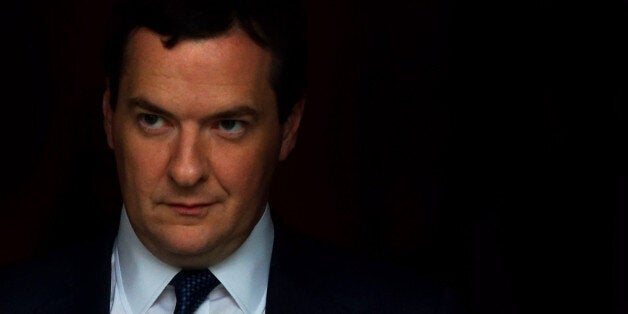 Chancellor of the Exchequer George Osborne leaves The Midland Hotel at the start of the second day of the Conservative Party Conference at Manchester Central in Manchester.