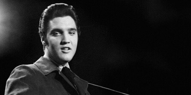 (FILES) Rock'n roll legend Elvis Presley is seen during a concert in a file picture taken in the 1950's. (Photo credit should read -/AFP/Getty Images)