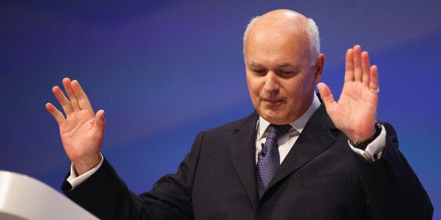 MANCHESTER, ENGLAND - OCTOBER 03: Iain Duncan Smith, Secretary of State for Work and Pensions takes applause after giving his his speech to delegates at the Conservative Party Conference on October,3 2011 in Manchester, England. Chancellor George Osborne will today announce his plans at the party conference to extend a council tax freeze in England. (Photo by Jeff J Mitchell/Getty Image)