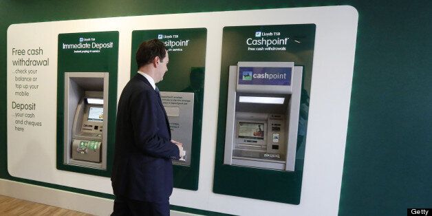 Britain's Chancellor of the Exchequer George Osborne approaches a cash machine at a brank of Lloyds TSB bank in central London on June 19, 2013. AFP PHOTO / POOL / LUKE MACGREGOR (Photo credit should read LUKE MACGREGOR,LUKE MACGREGOR/AFP/Getty Images)