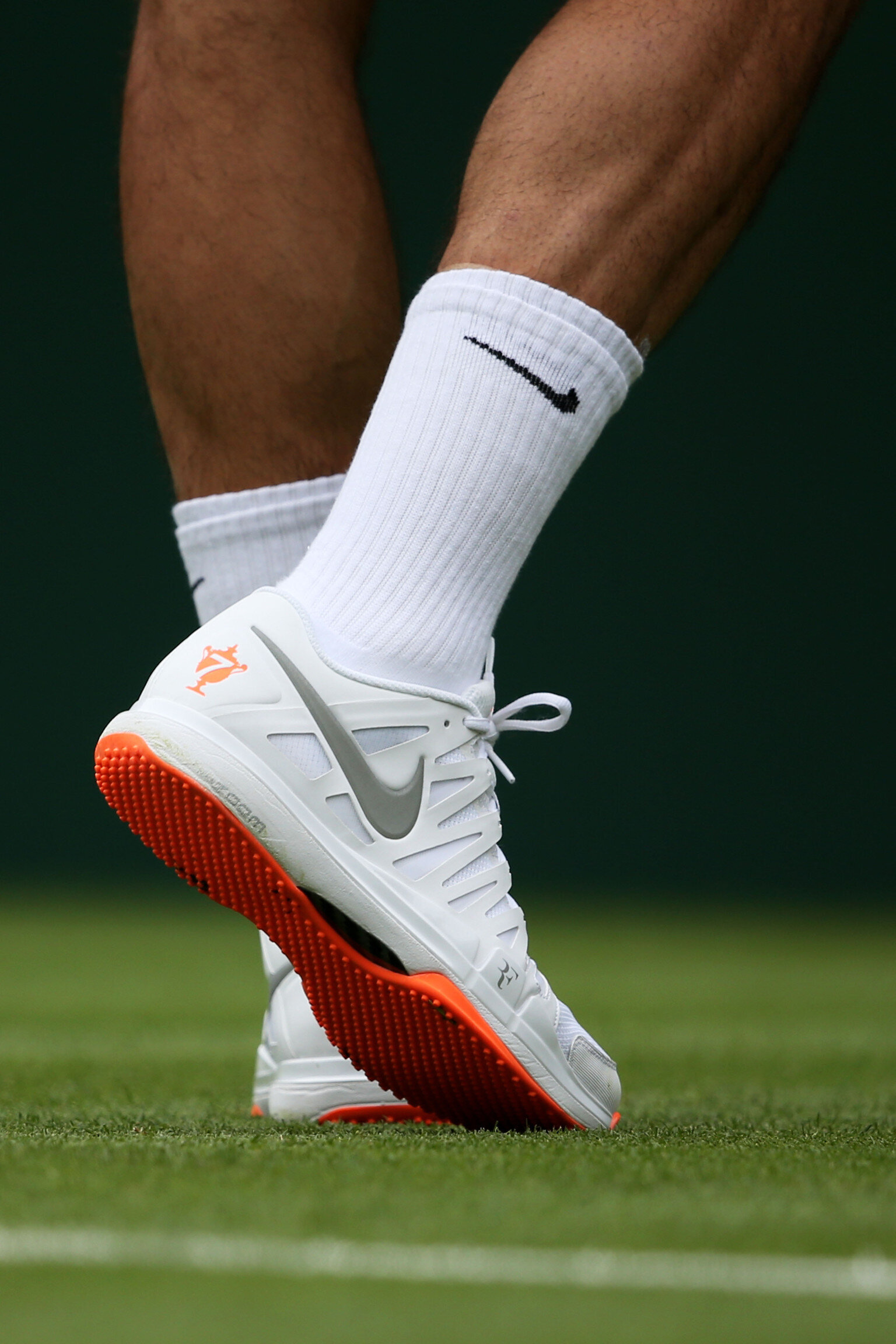 Roger Federer's Orange Nike Soles 