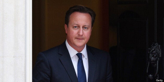 LONDON, ENGLAND - JUNE 19: British Prime Minister David Cameron leaves Number 10 Downing Street to greet His Majesty King Abdullah II of Jordan on June 19, 2013 in London, England. As well as meeting with Mr Cameron, King Abdullah II will hold talks with British Foreign Secretary, William Hague and deliver a lecture at the Royal College of Defence Studies. (Photo by Oli Scarff/Getty Images)