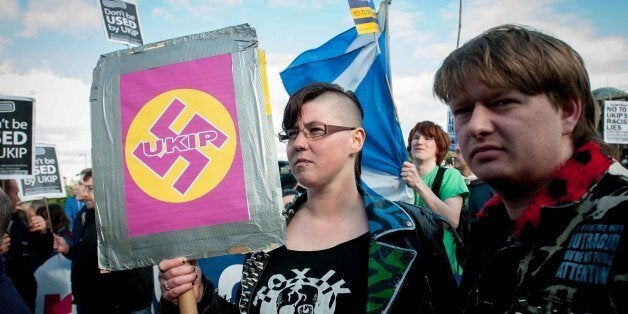 Demonstrators from various organisations travelled from all over the country to protest against UKIP leader, Nigel Farage at the UKIP rally for the European elections, held in Edinburghs' Corn Exchange venue. Friday, 9th May 2014.