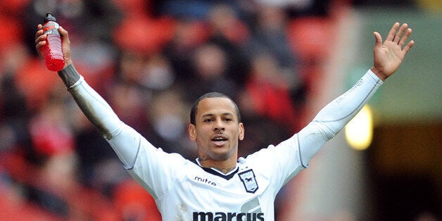 Ipswich Town's DJ Campbell waves to away fans after the final whistle